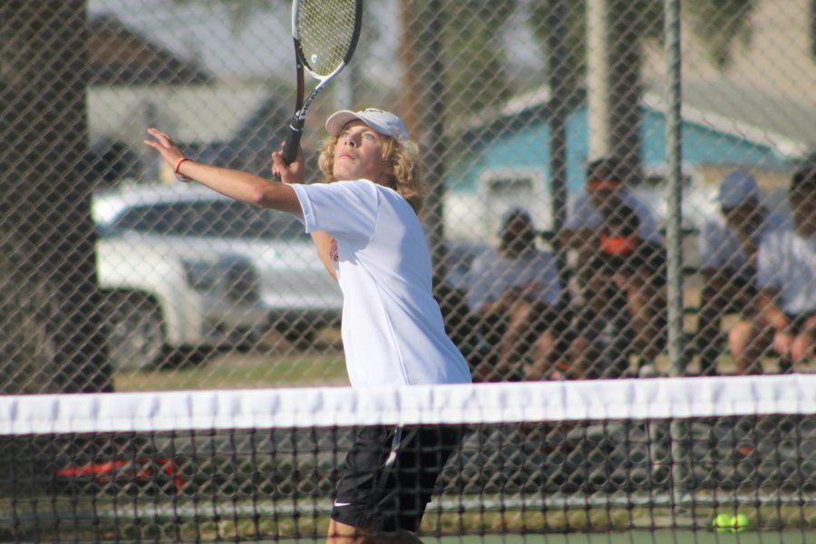 Junior Colby Nehring going in for a hit (photo credits: Essence Gleplay and Anna Isom, WHS journalism)